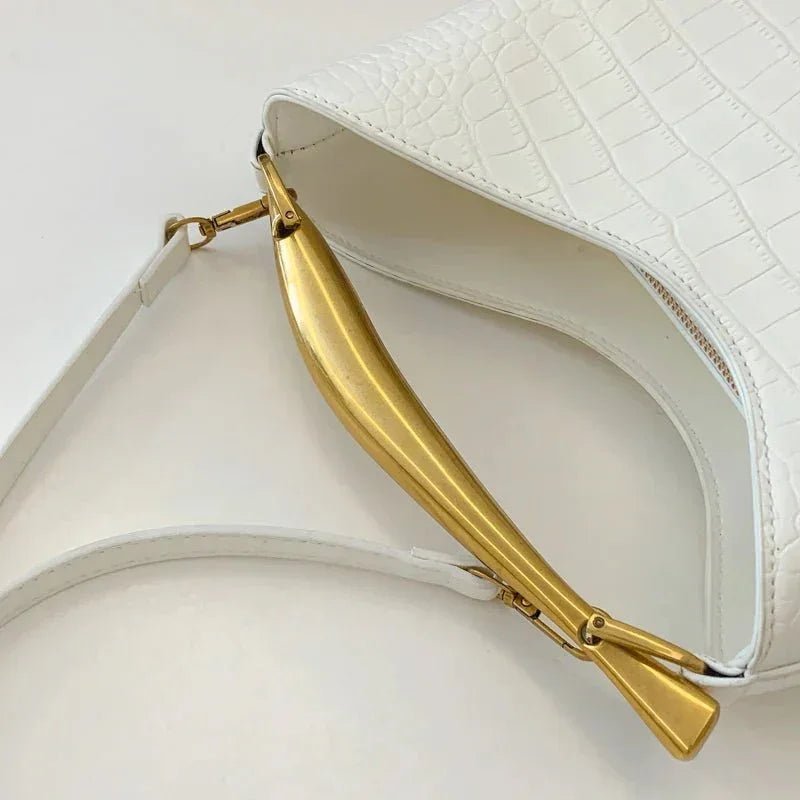 White crocodile pattern handbag with gold top handle and detachable shoulder strap