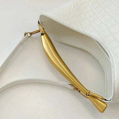 White crocodile pattern handbag with gold top handle and detachable shoulder strap