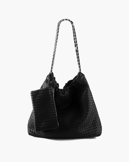Black woven leather shoulder bag with chain strap and matching pouch on white background