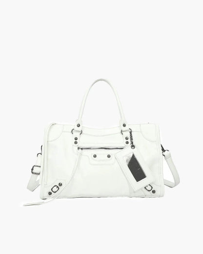 White minimalist handbag with spacious interior, top handles, and silver hardware details