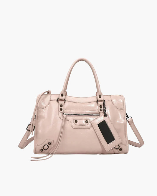 Minimalist white stylish handbag with spacious interior, top handles, and zip closure