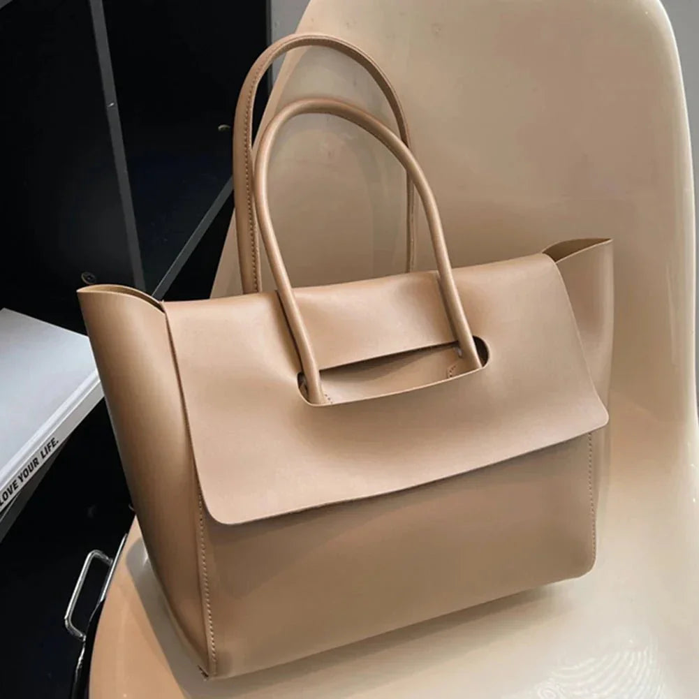 Beige vegan leather large shoulder tote purse with modern, versatile flap design