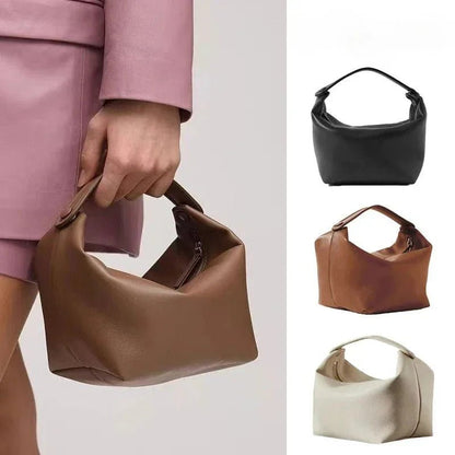 Women's genuine leather handbags with unique handle design in black, brown, and beige, shown with model holding brown bag.