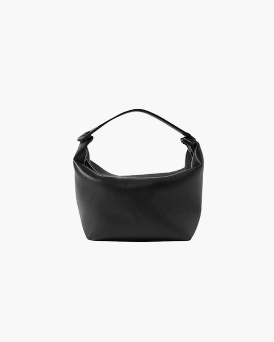 Black genuine leather women's handbag with unique modern design and short handle