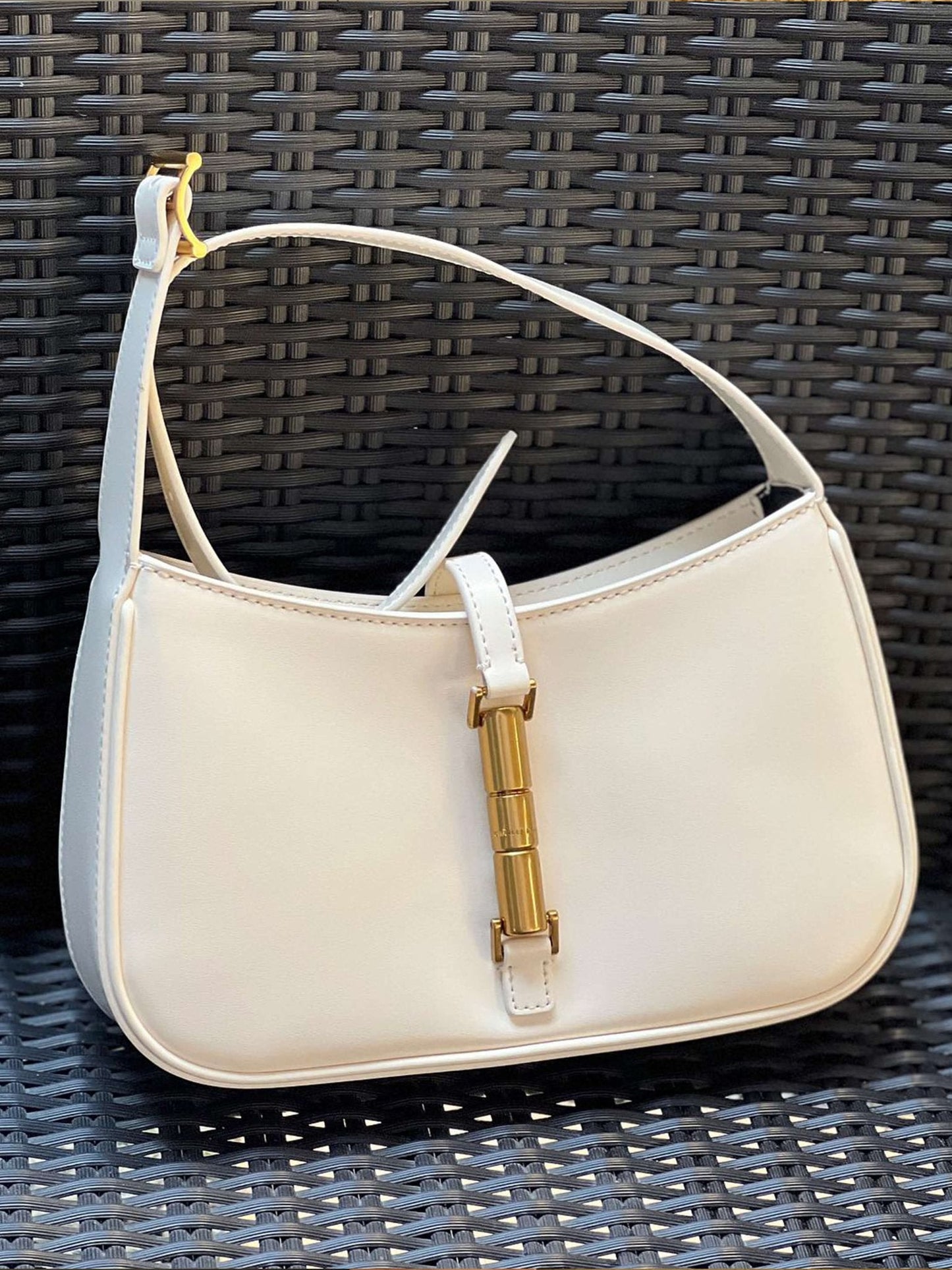 Rose clutch with strap