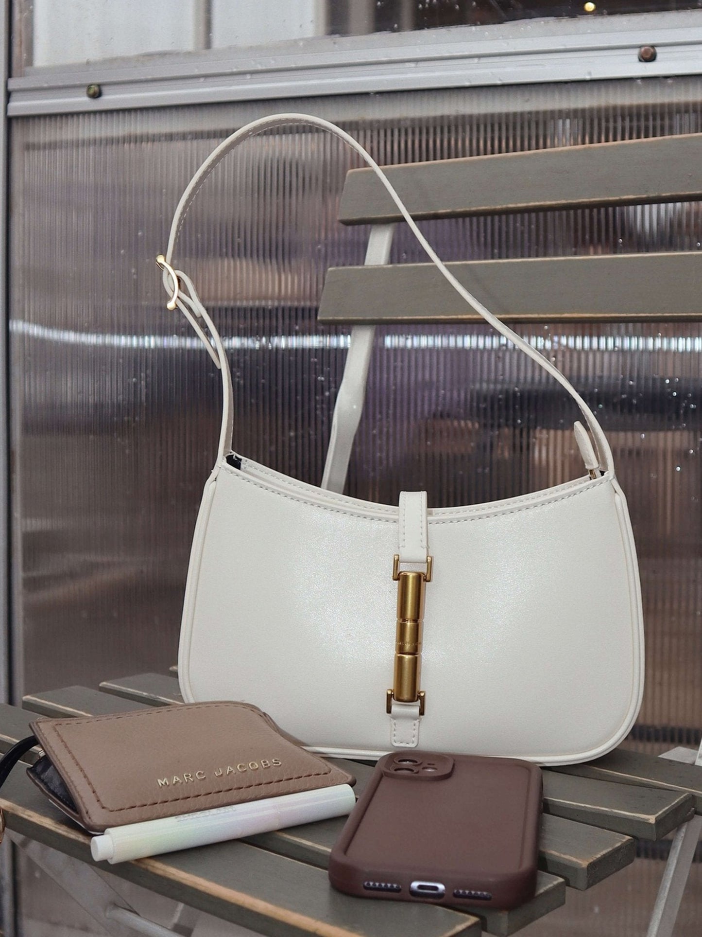 Rose clutch with strap